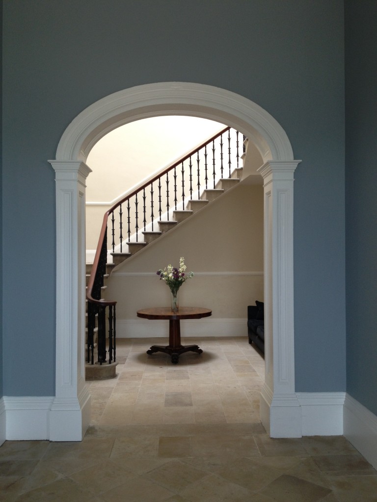 East Lodge entrance hall after refurbishment of the stone floor and walls.